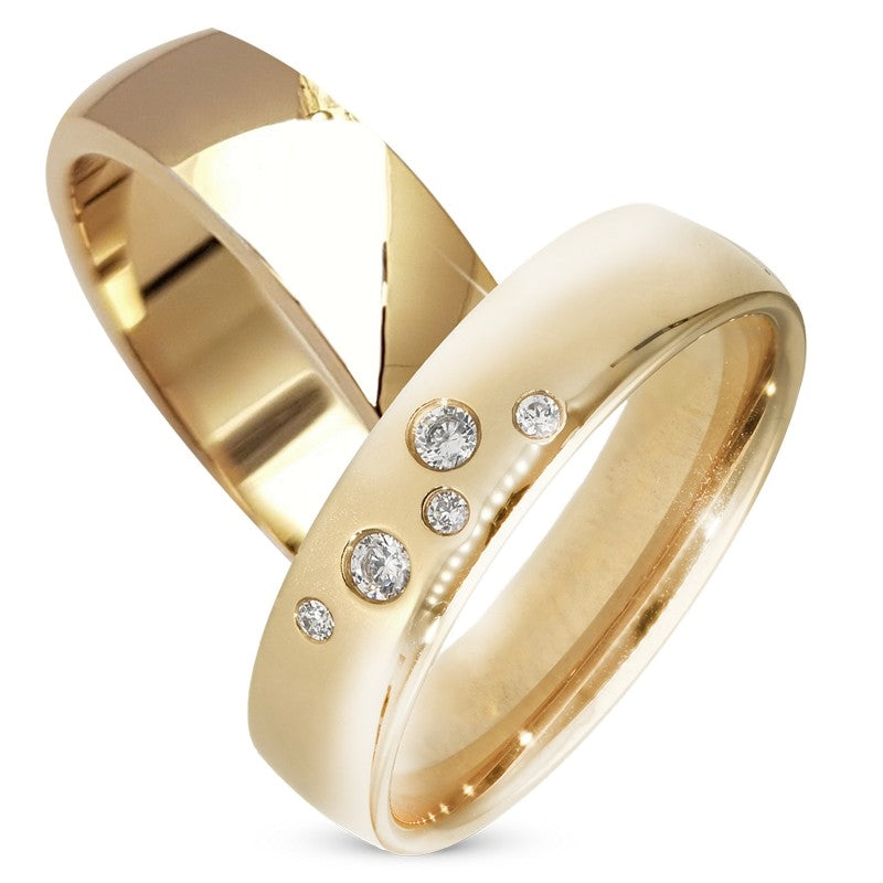 Stilfulde Aagaard vielsesringe i 9 eller 14 karat guld med 0,22 ct lab grown diamanter, sæt med blanke ringe i 5 mm bredde.